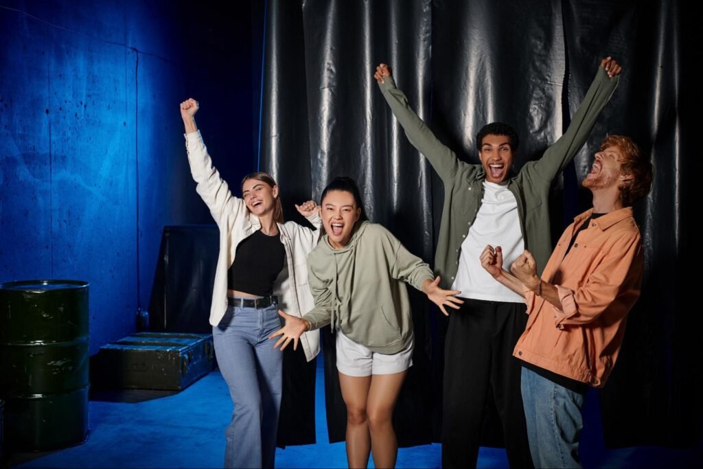 Group celebrating after completing an escape room at Mystery Mayhem; one of the most exciting things to do in Butler PA.
